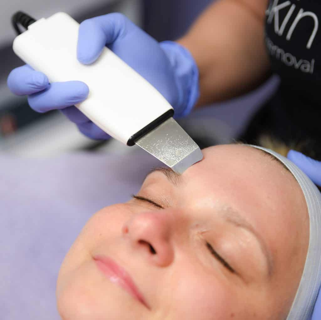 Ultrasonic facial treatment at skin studio